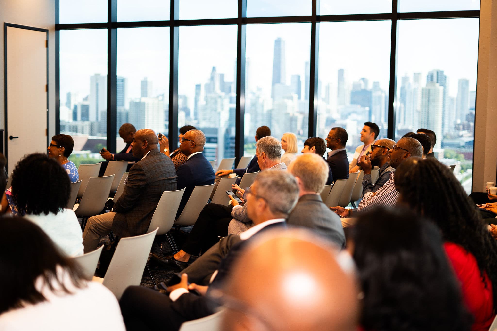 Event audience with Chicago skyline