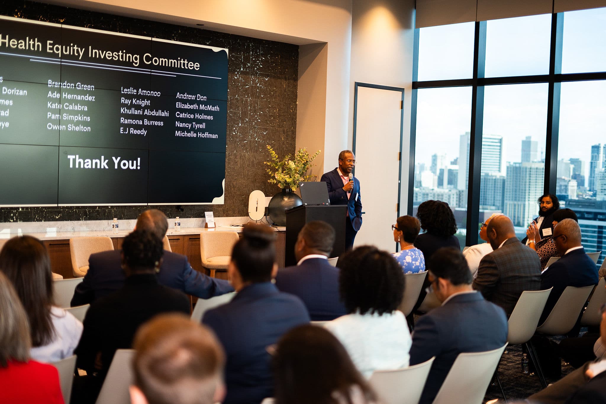 Paul Burton presenting at Health Equity Investing Symposium